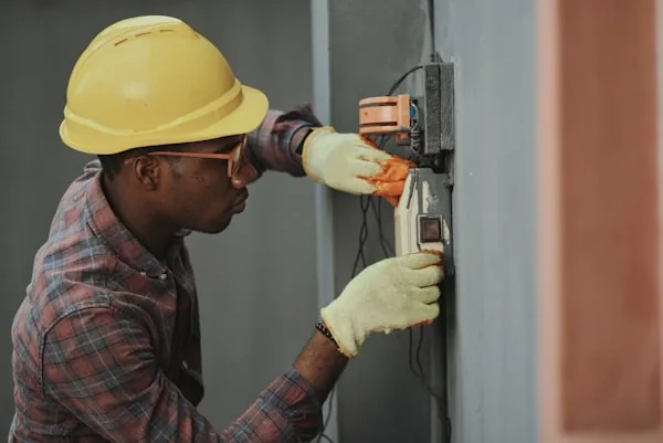 Electrician at work, showing the people behind an electrical business